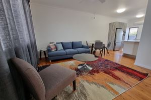 Living Room at Adamstown Short Stay Apartments.